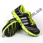 Детские кроссовки Adidas черно-зеленые шнурок